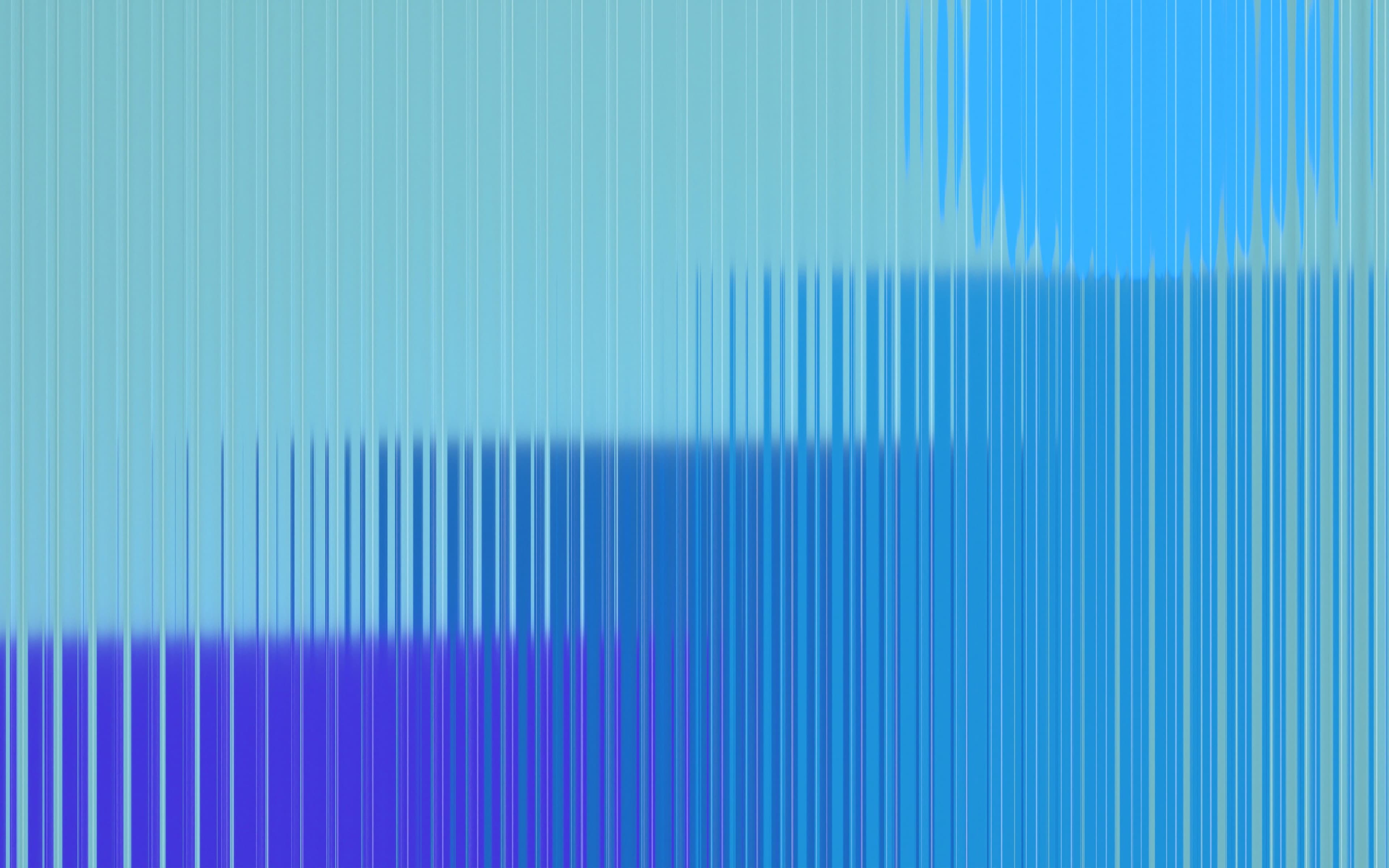 Blue and teal light refracted through a finely ribbed surface.